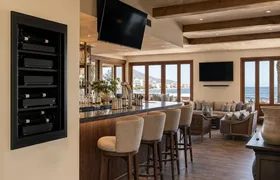 Multi-screen DStv setup in a Noordhoek guest house lounge